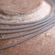 Шнур резиновый, с отверстием, цвет серый, 2 мм
