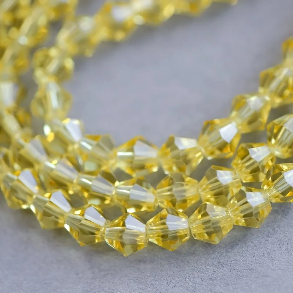 бусина, стекло биконус 6, цвет бледно-желтый, 6 мм